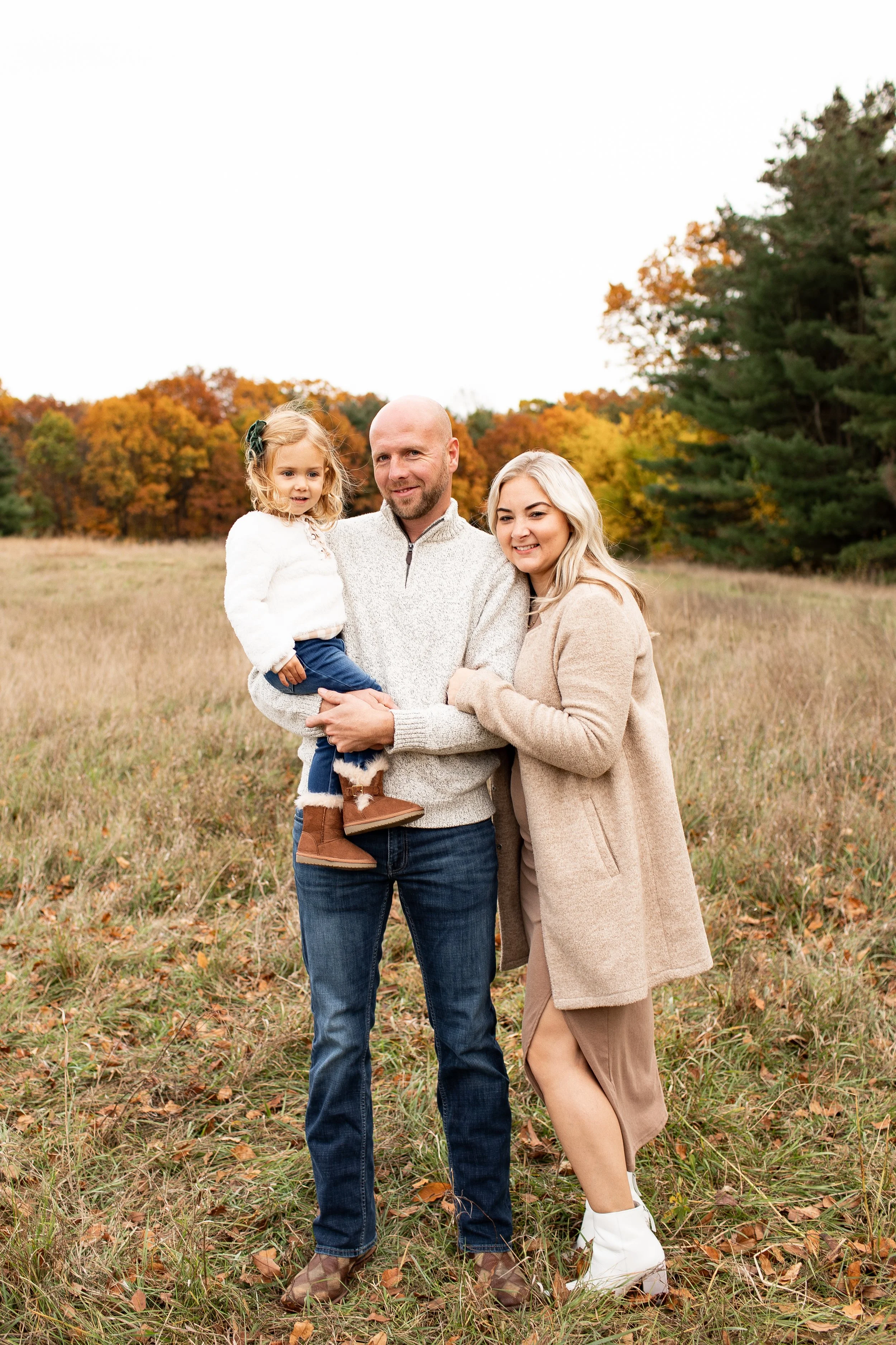 Mayberry Acres family by pasture-raised cattle